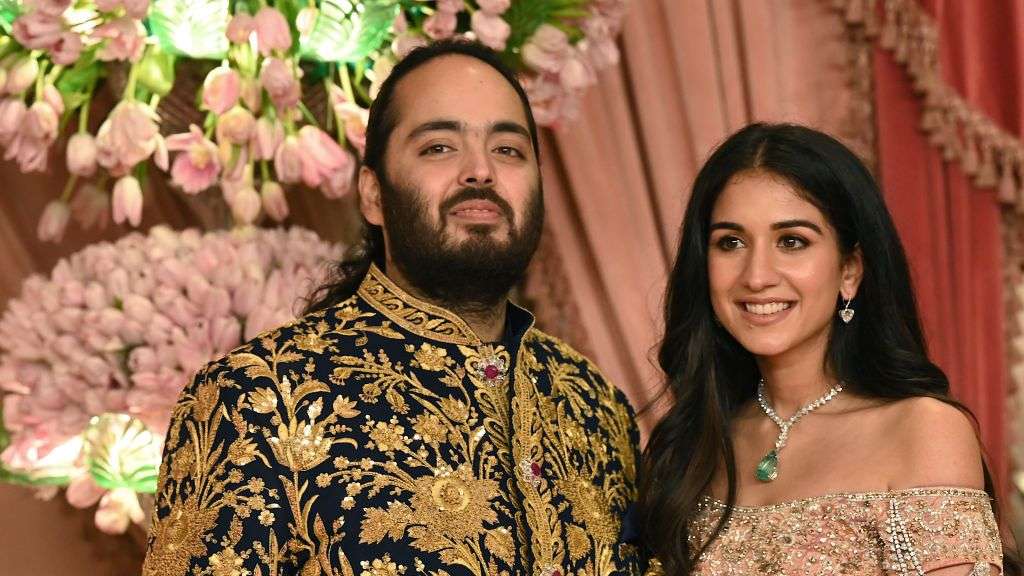 Ambani and his wife at their wedding